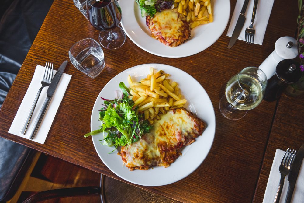 Flat,Lay,Chicken,Parmigiana,With,Chips,And,Salad
